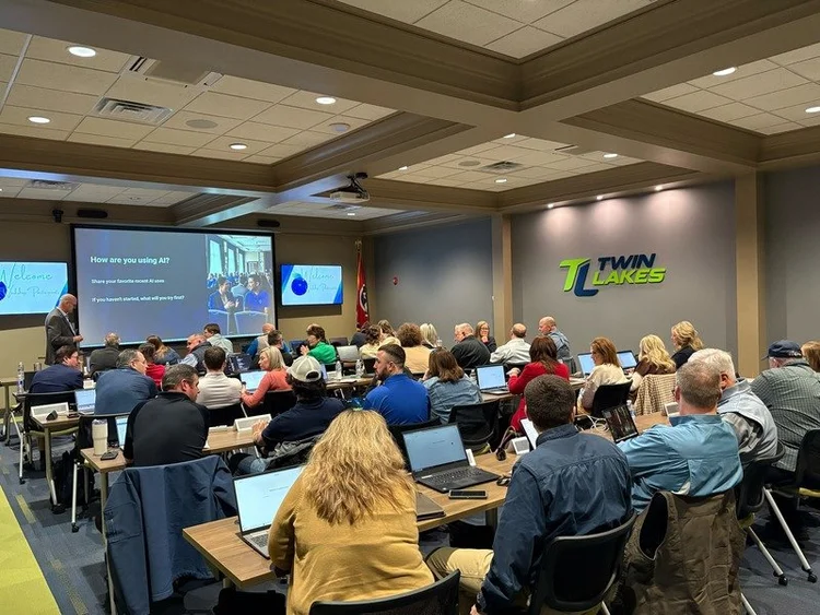 AI workshop participants learning practical business uses for AI